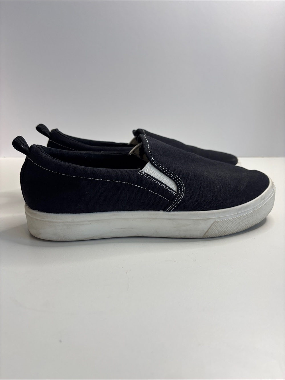 Skechers Black Slip-On air cooled memory foam Sneakers with White Sole
